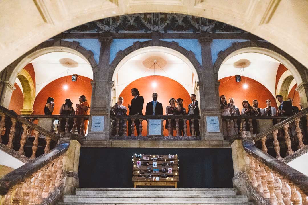 guests on marble staircase