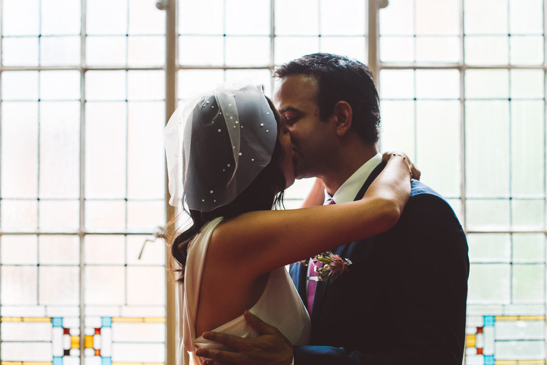 newlyweds kissing