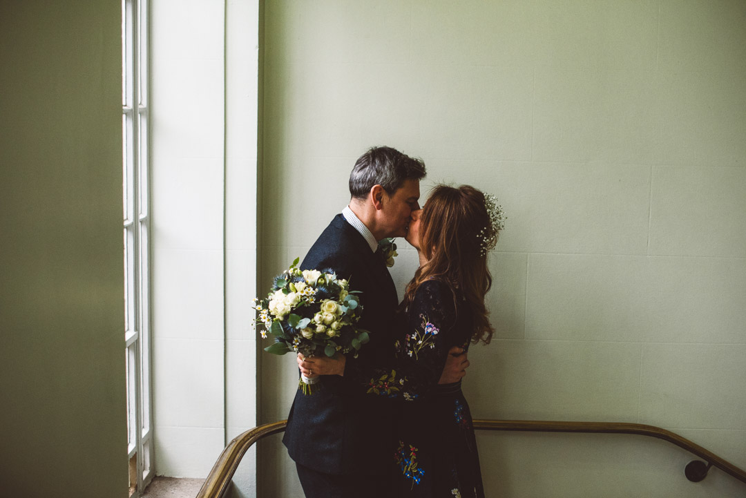 newlyweds kissing
