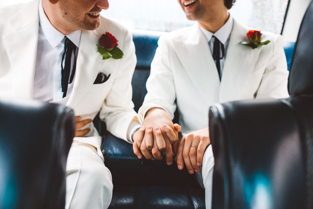 newlyweds holding hands