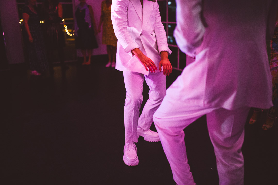 West Reservoir Centre wedding party grooms dancing