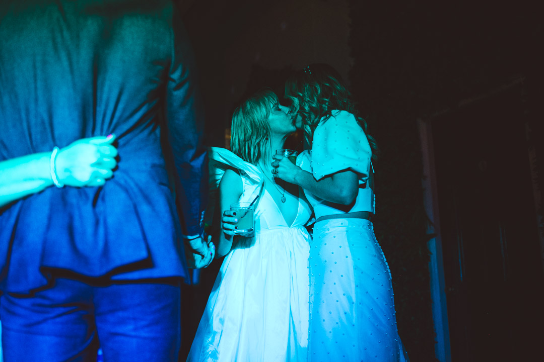 Jolly Gardeners wedding brides kissing
