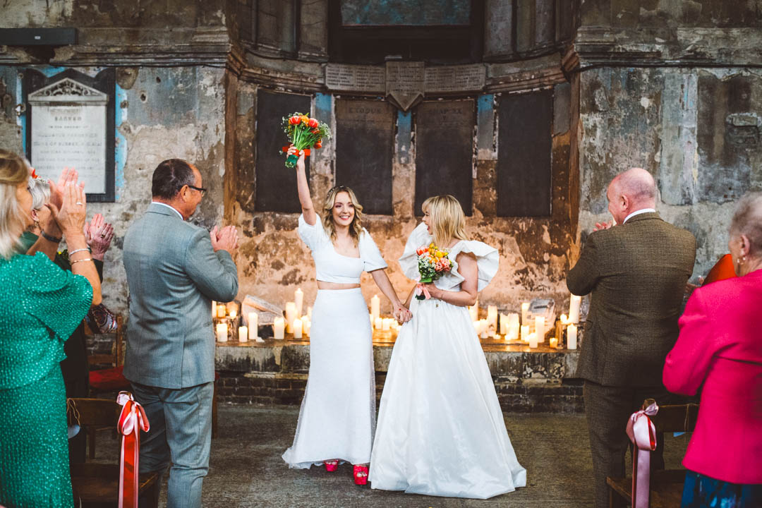 Asylum Chapel lesbian wedding walking out