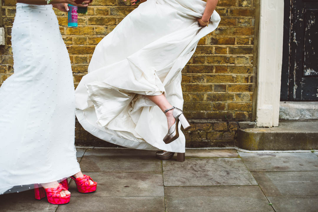 showing off wedding shoes