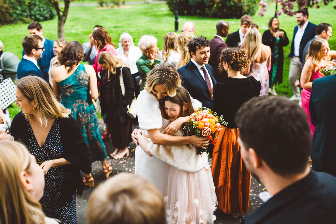bride hugging niece