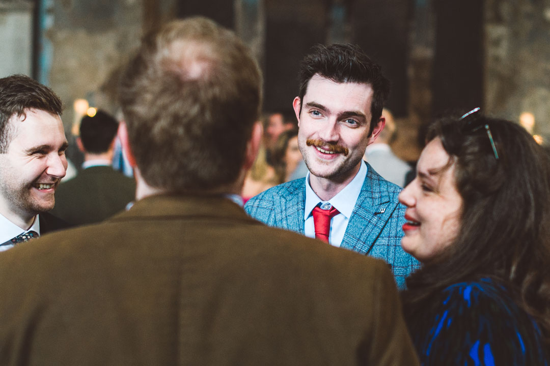 wedding guests chatting