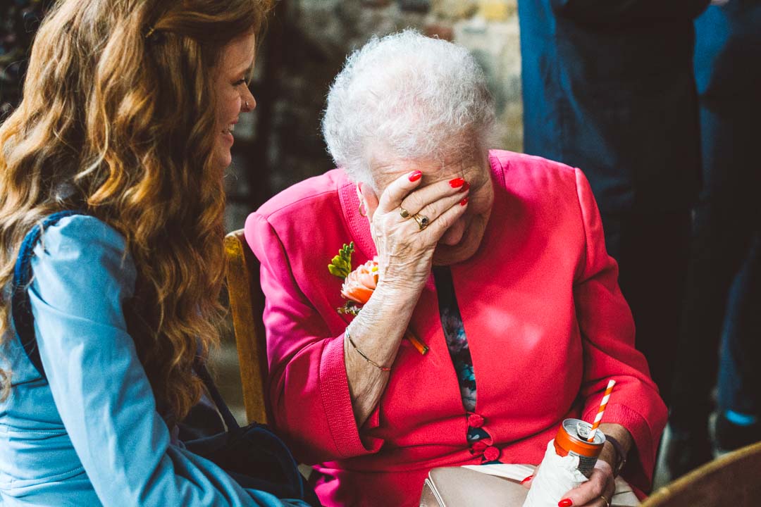 elderly woman laughing