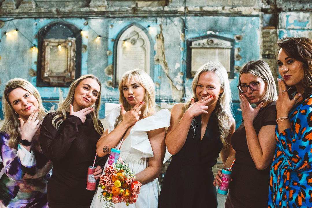 bride with friends silly pose