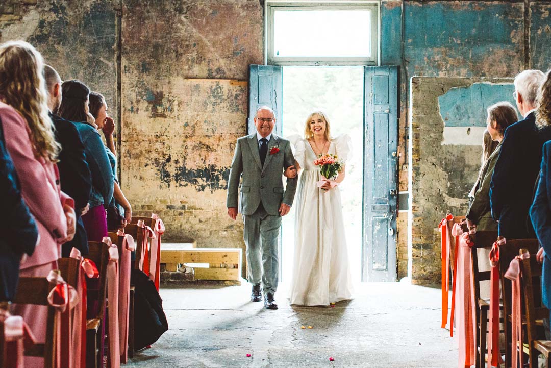 bride with father walking down the aisle