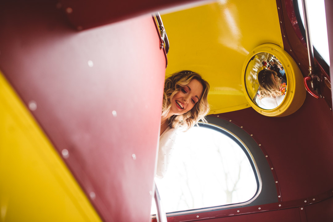 bride on wedding bus