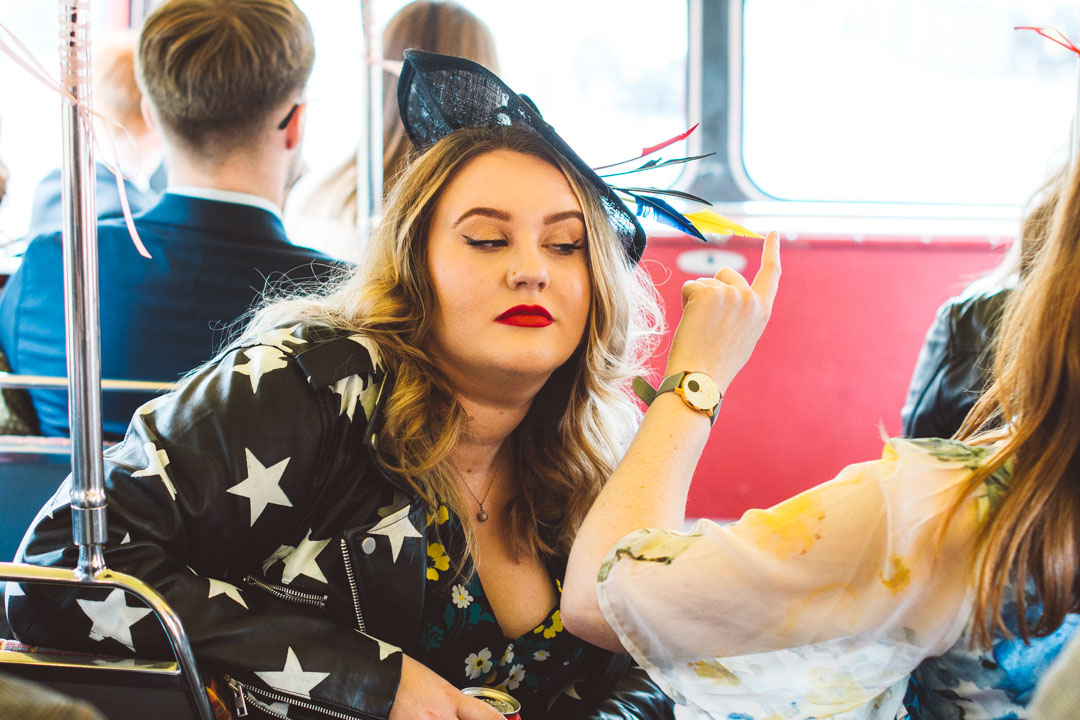 candid shot on wedding bus