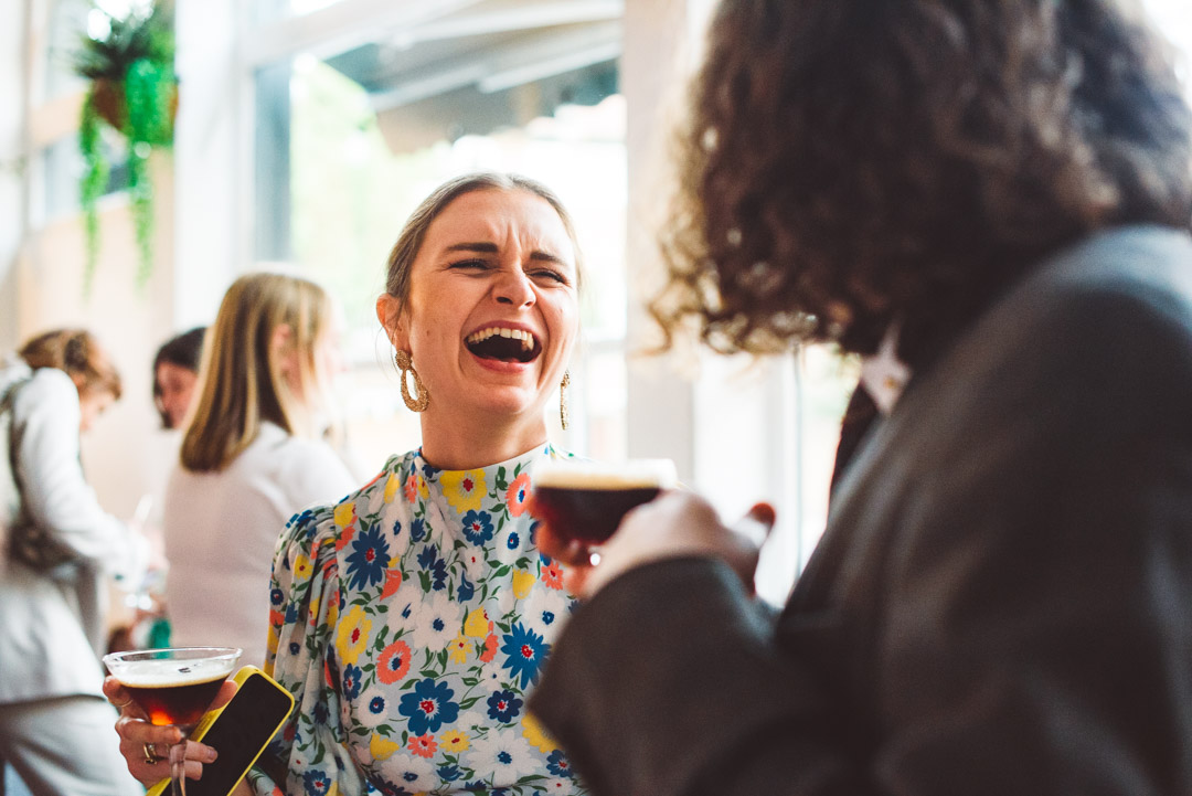 candid photo of guest laughing