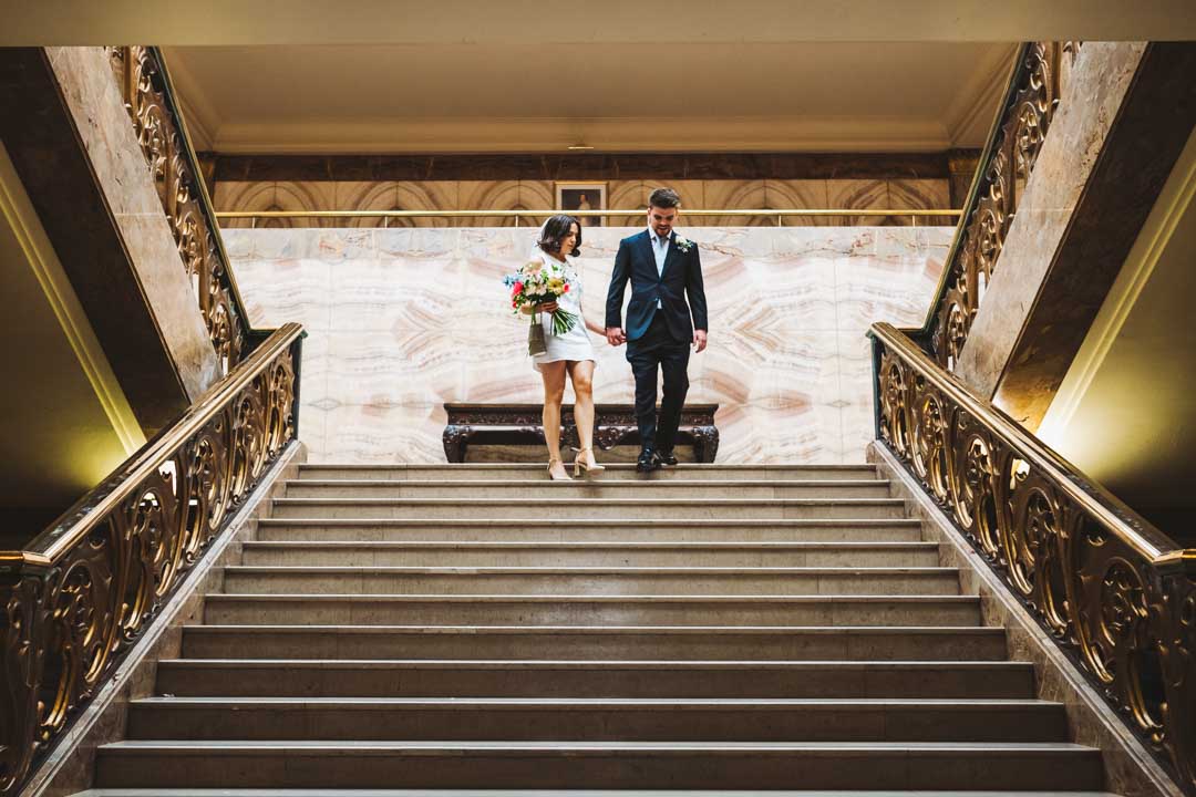 Wandsworth Town Hall couple walking down marble staircase