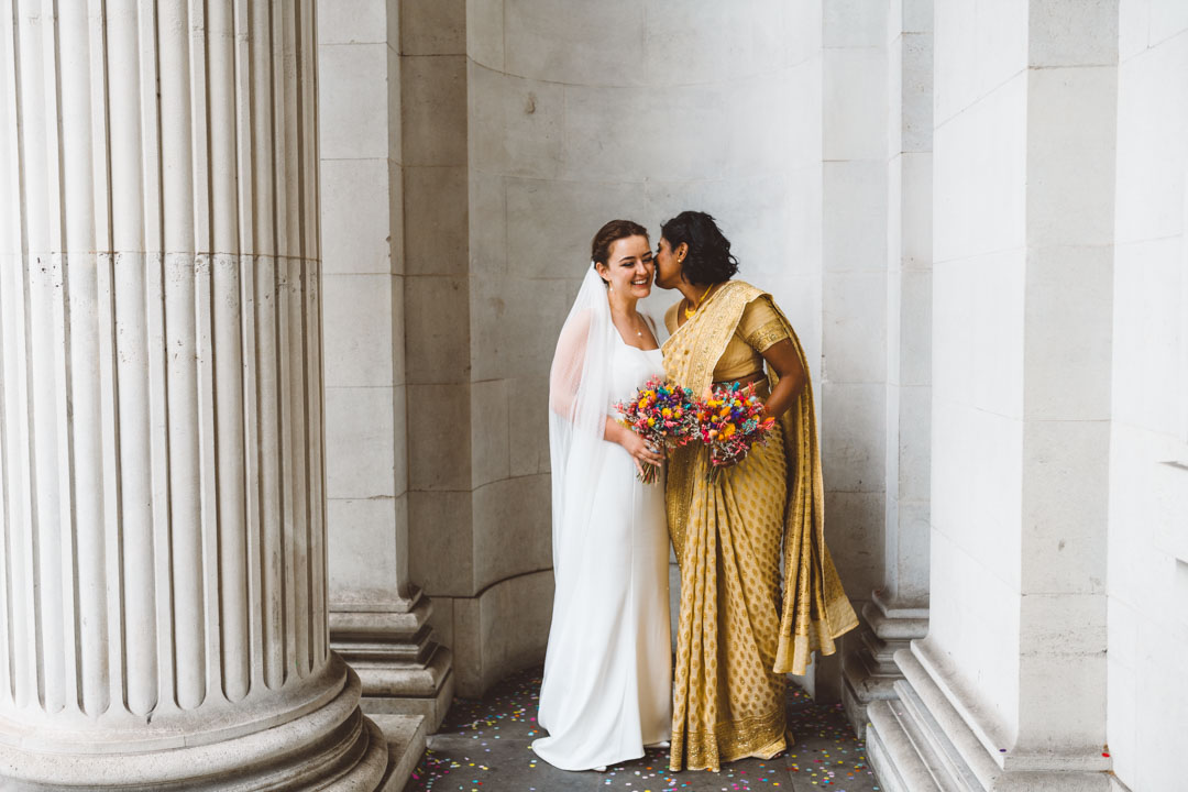 Coin Laundry wedding brides smiling