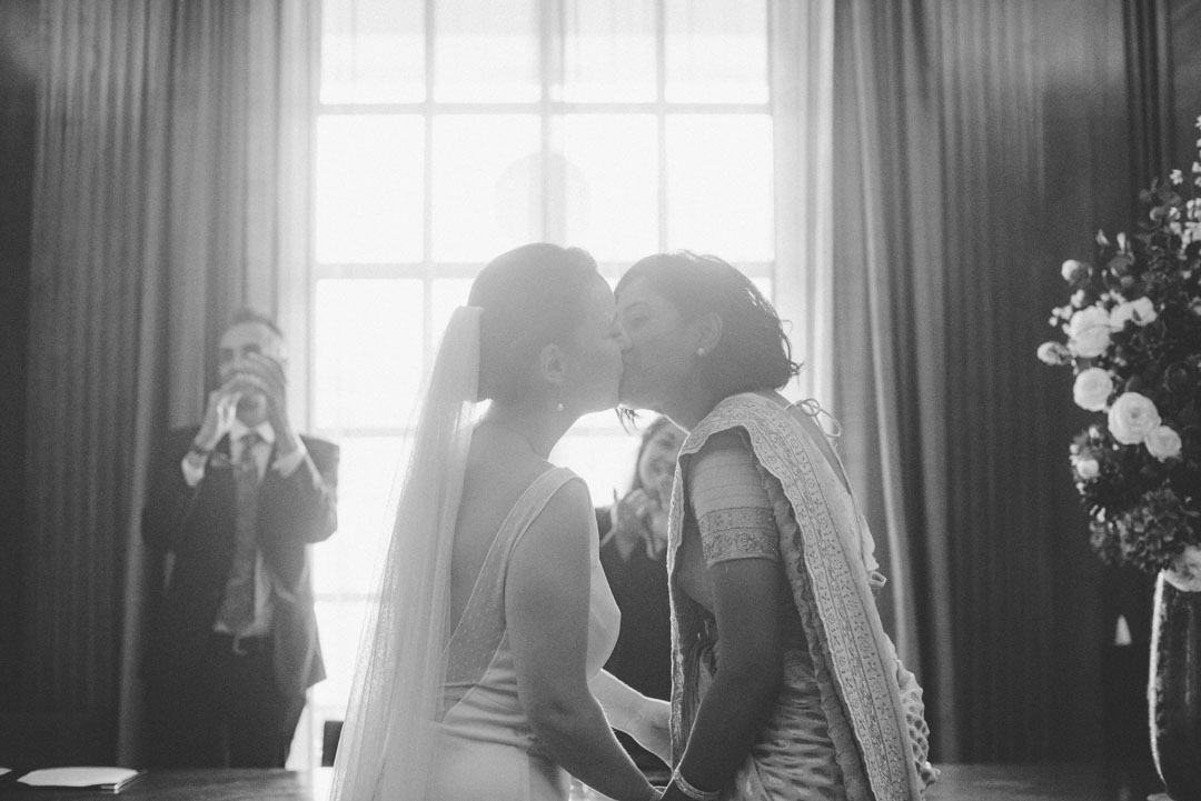 brides kissing