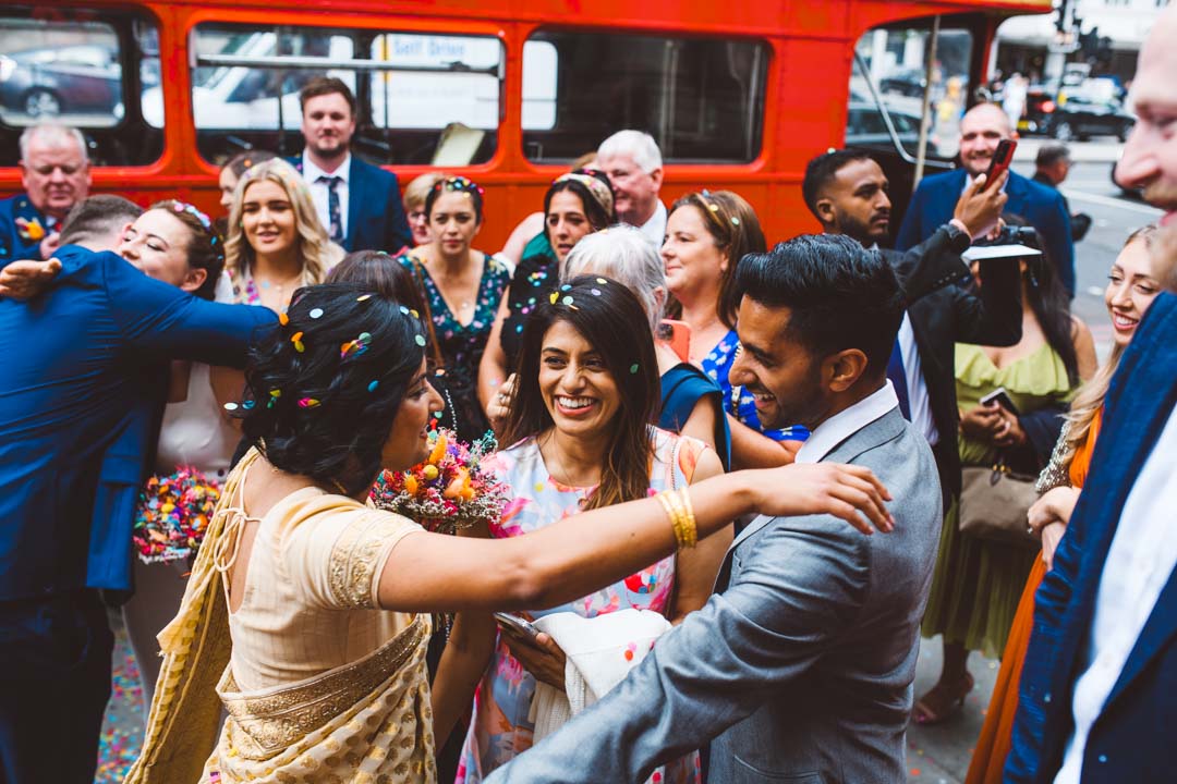 guests congratulating brides