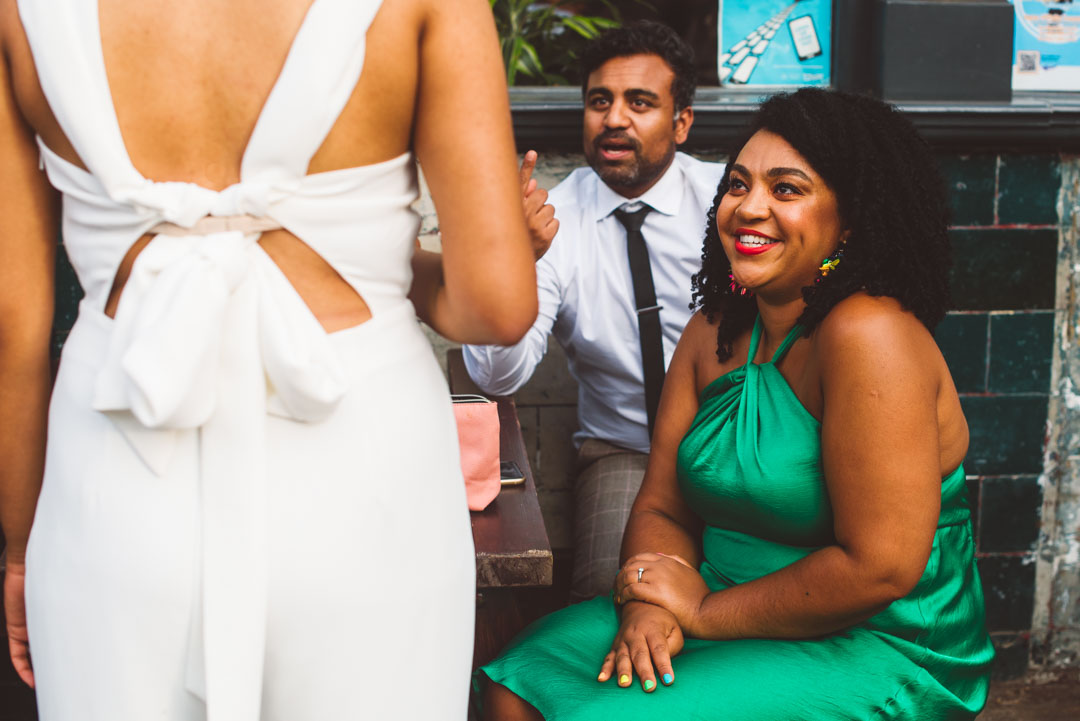 bride chatting with guests