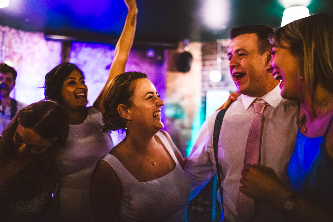 Coin Laundry wedding brides dancing with guests