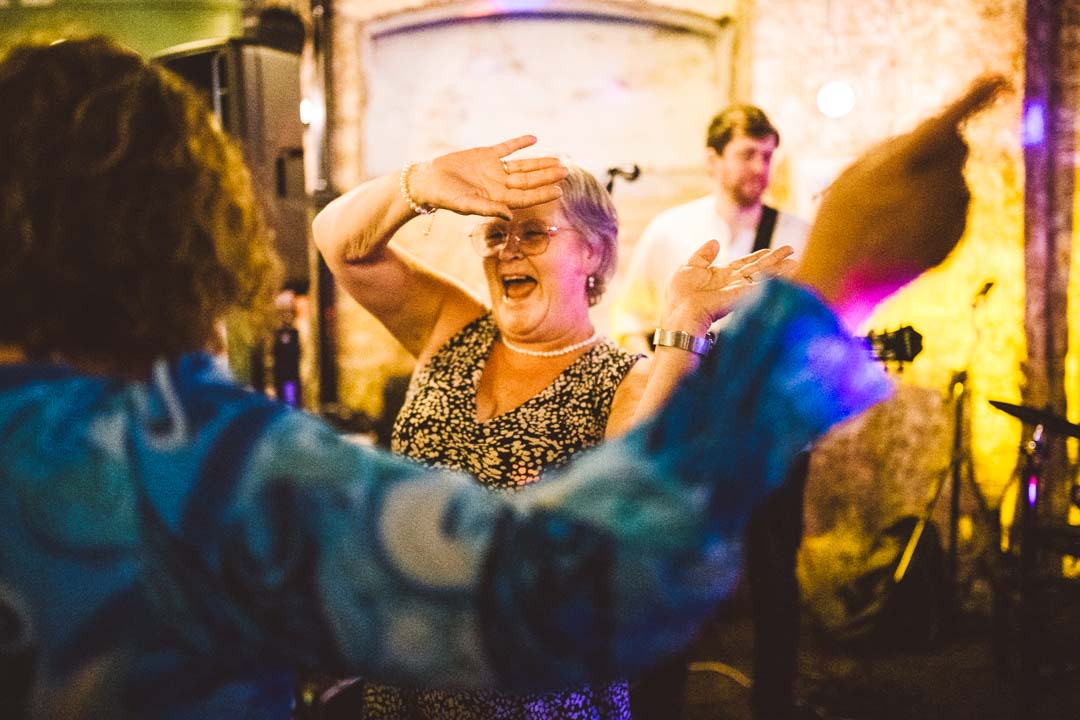 Coin Laundry wedding party guests dancing