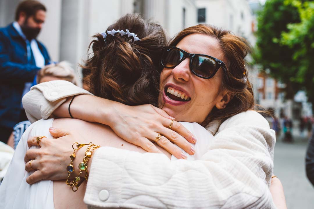 friend congratulates bride