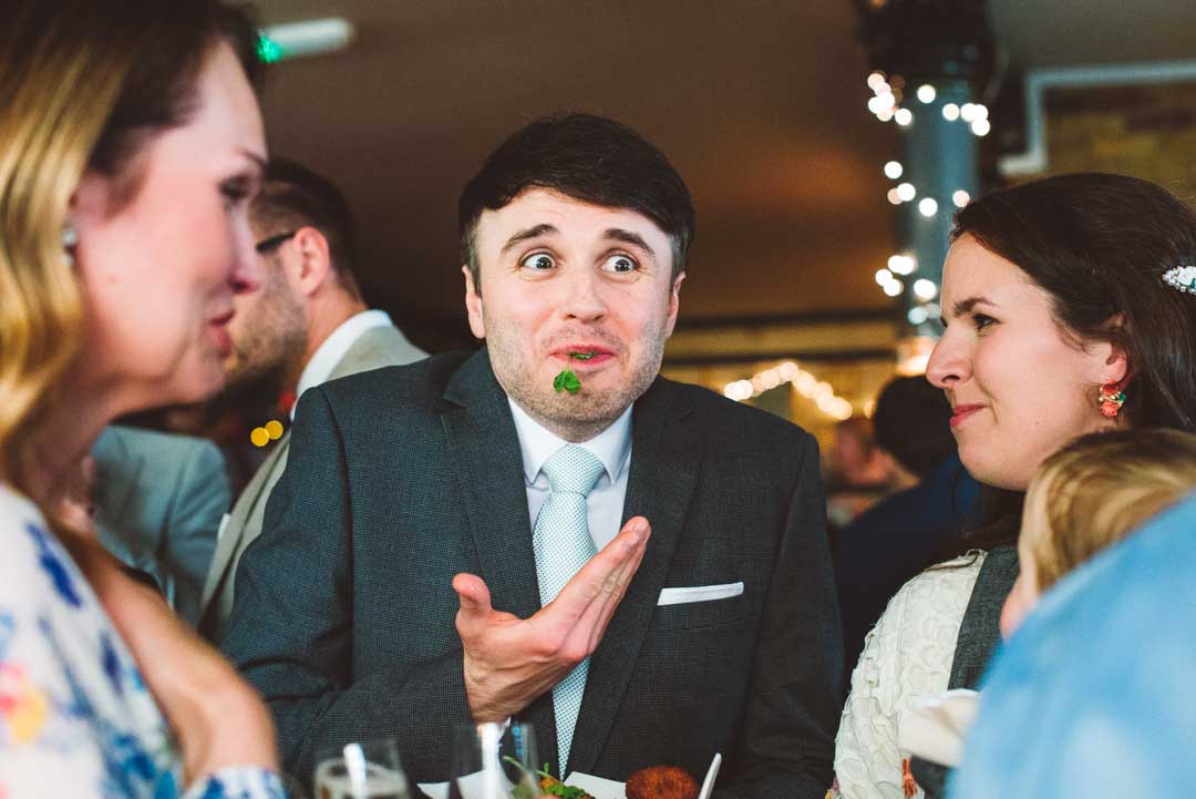 candid shot of wedding guests