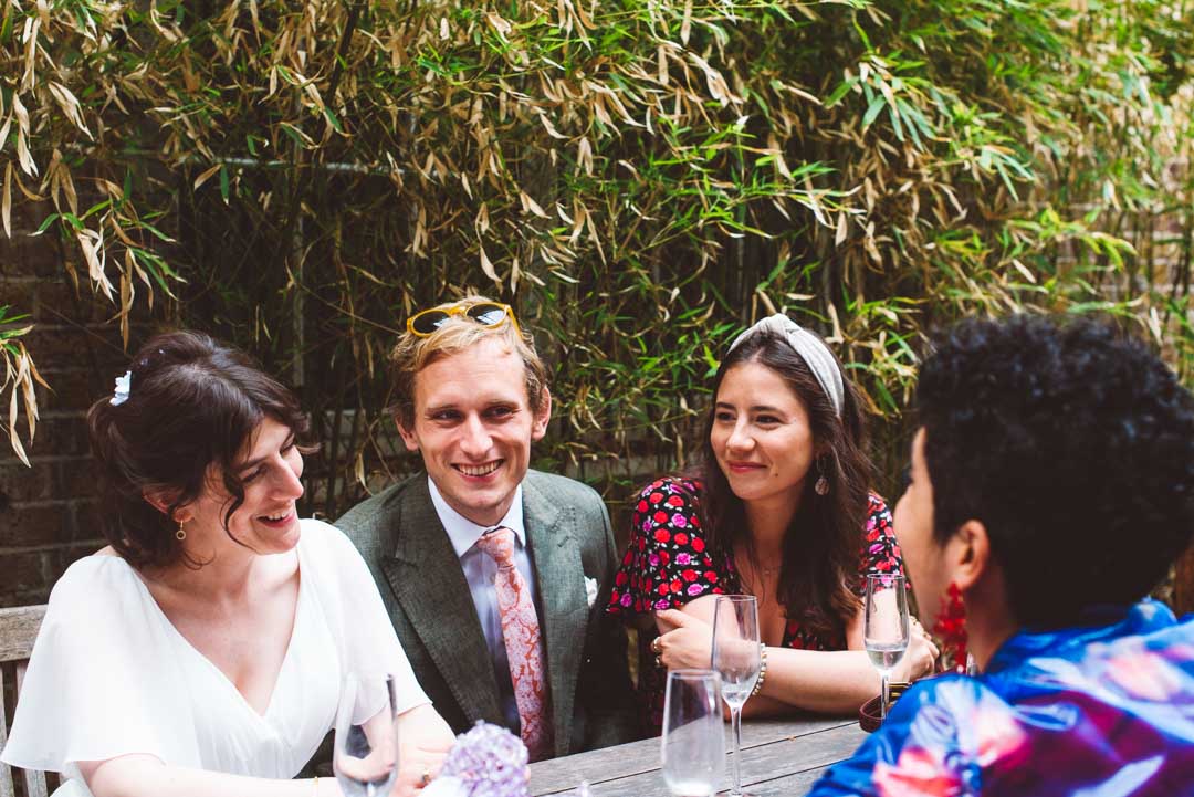 informal wedding photo bride with guests