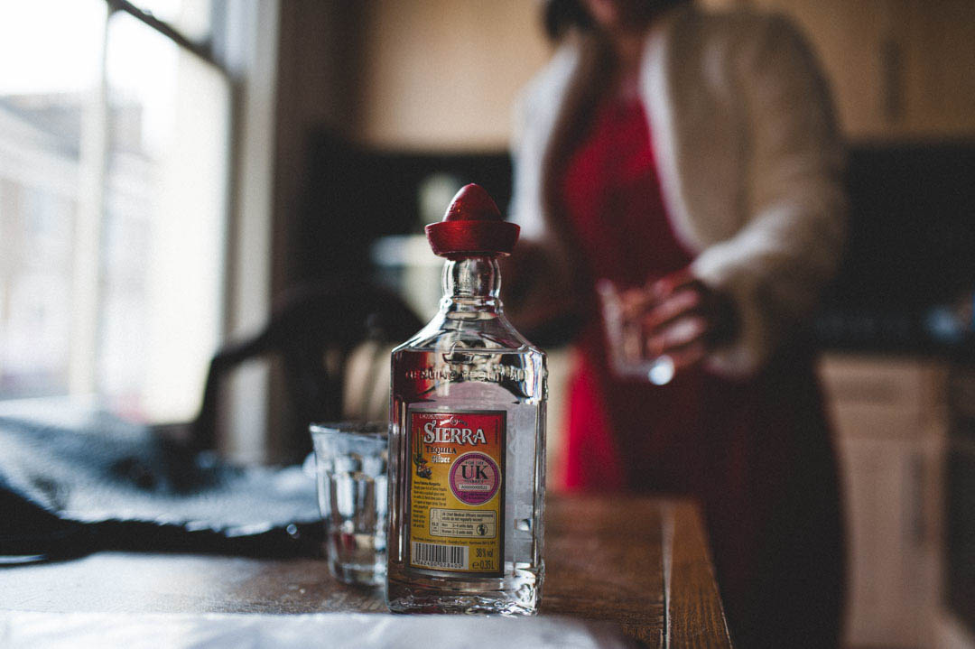 bride having a last drink before leaving home