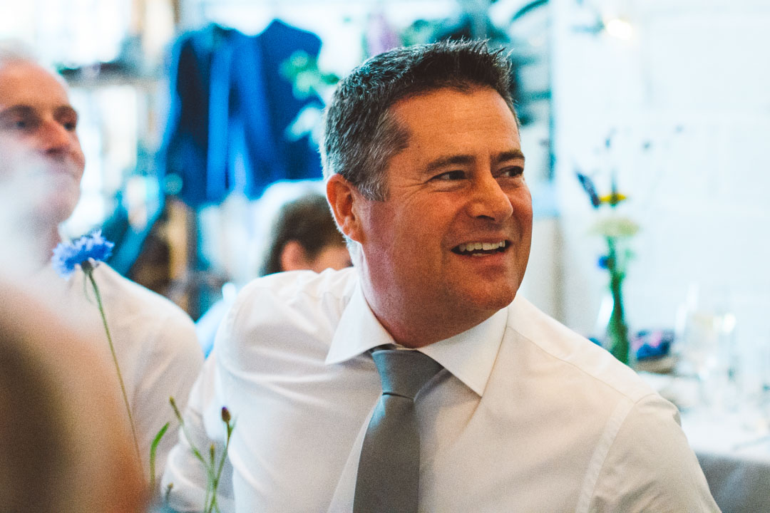 wedding guest listening to speech