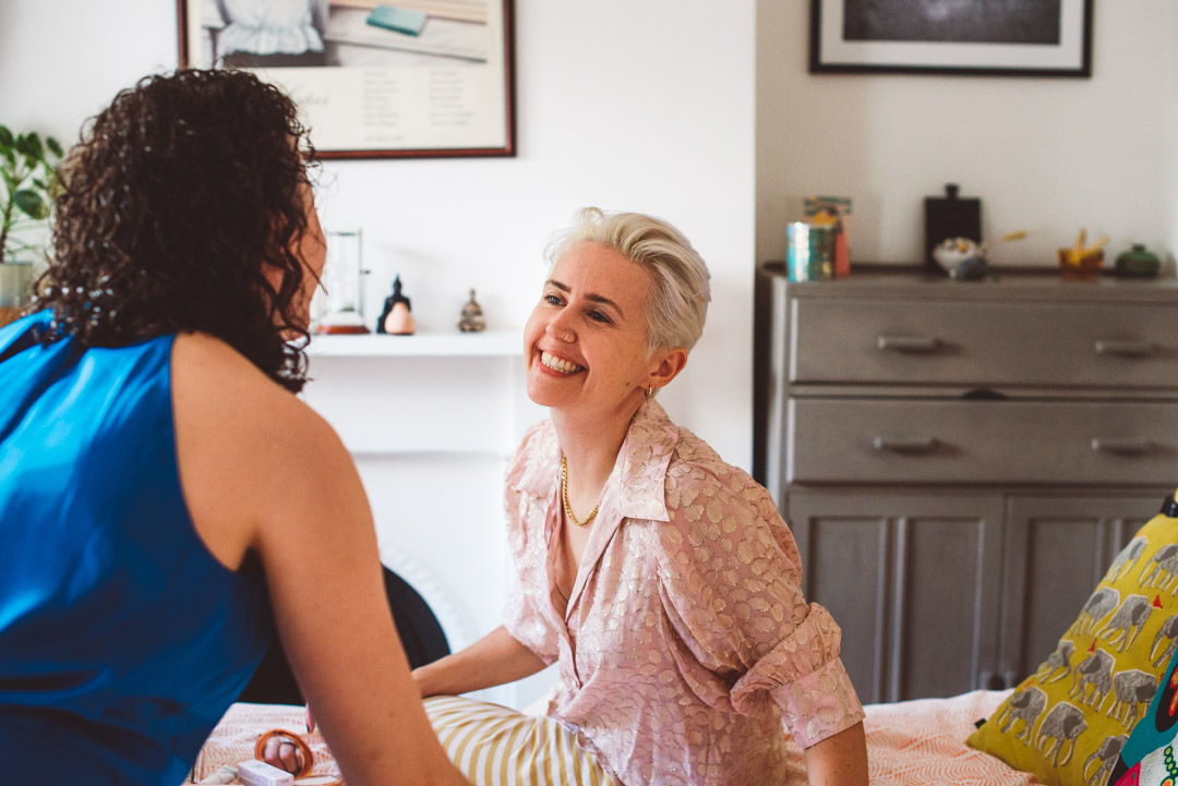 lesbian couple getting ready for wedding