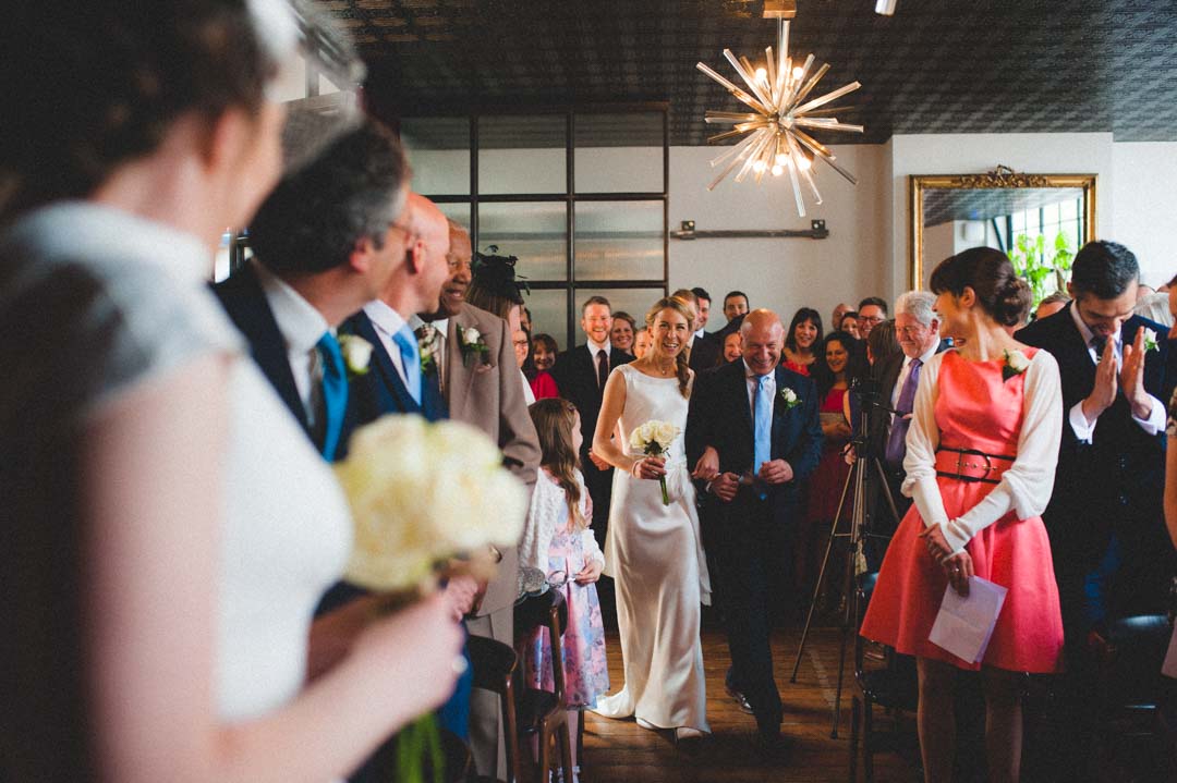 wedding ceremony walking down aisle with dad
