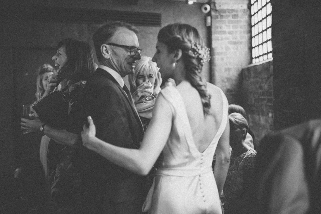 wedding guests laughing
