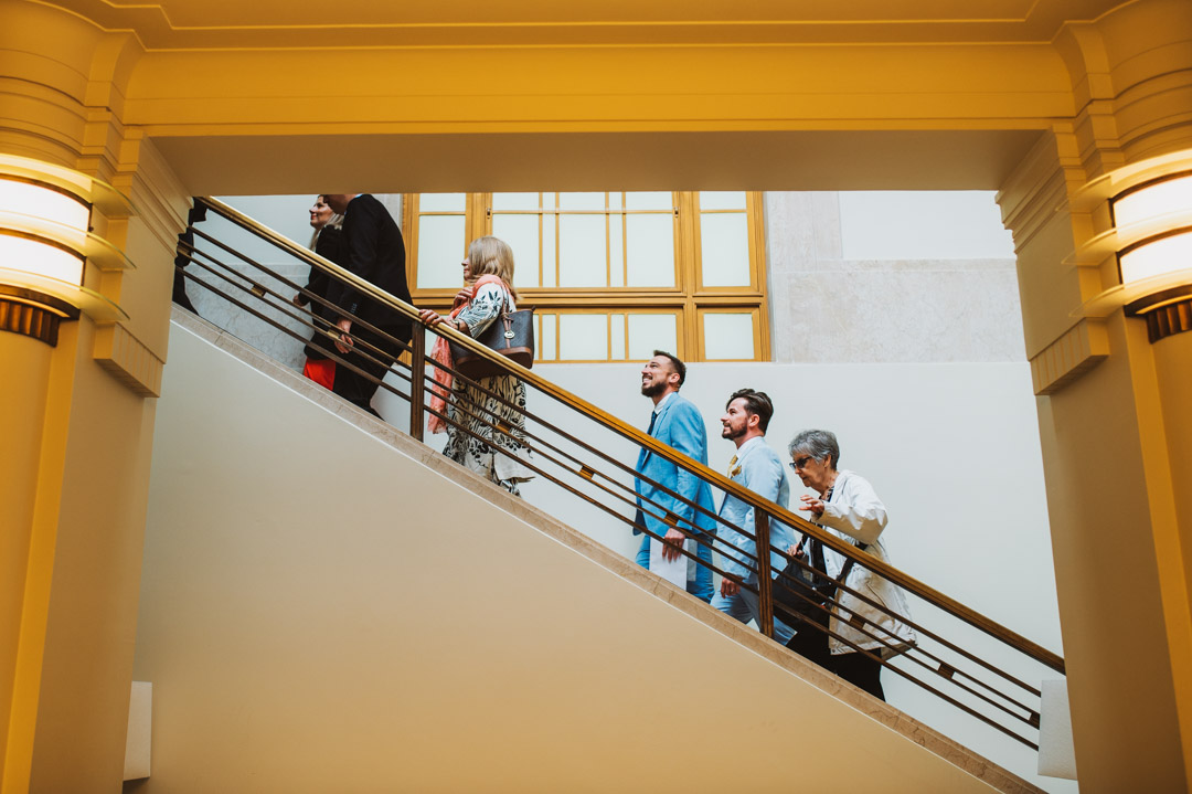 Hackney Town Hall wedding guests walking up stairs