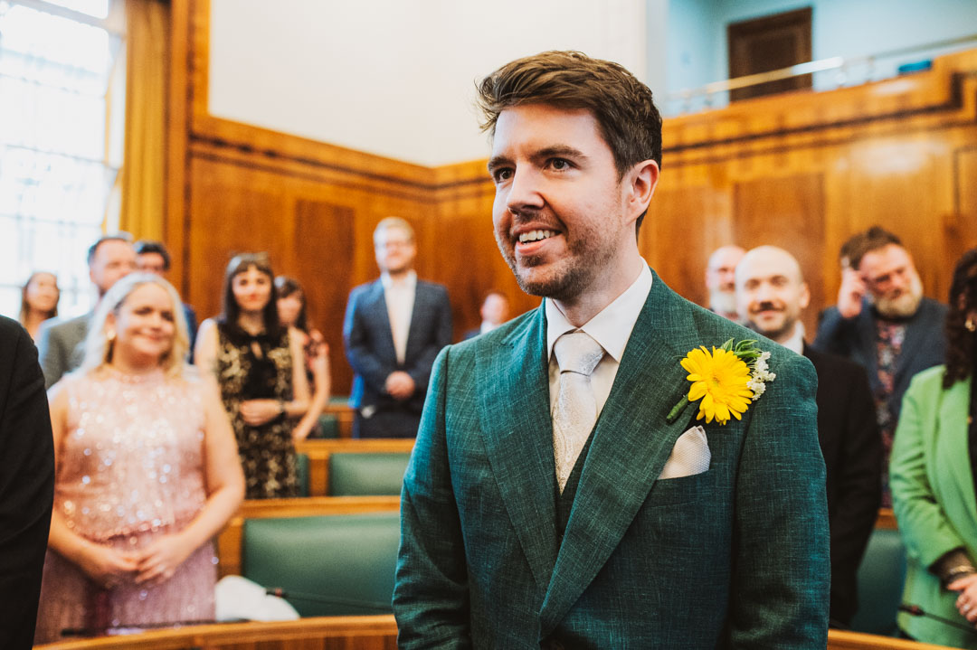 groom walking down the aisle