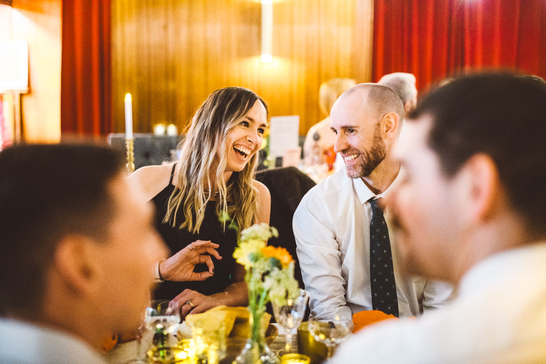 candid wedding photography guests smiling