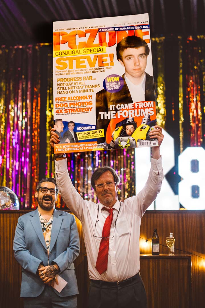 wedding speech guest holding funny poster