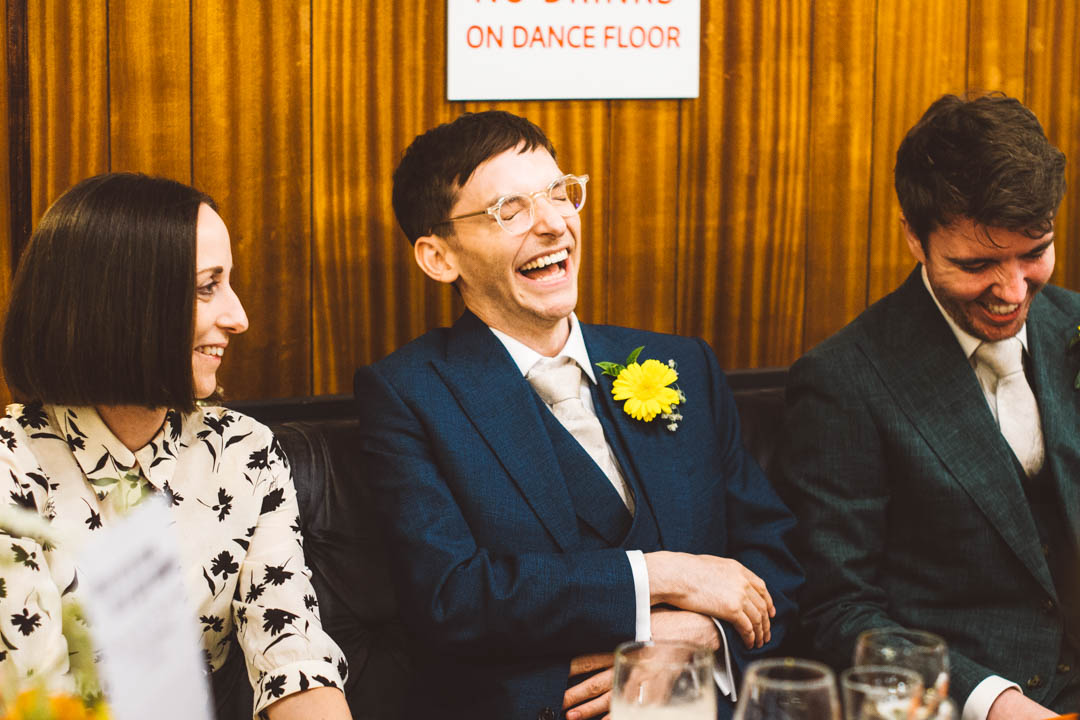 fun wedding photo grooms' reaction to speech
