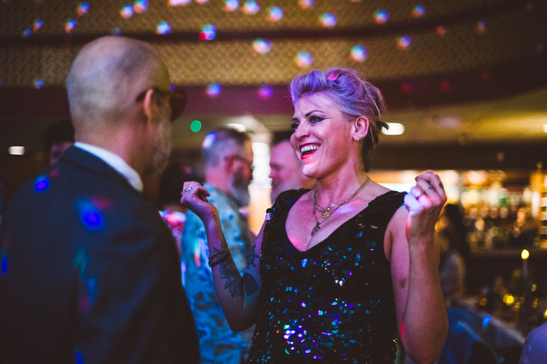 guest dancing and smiling