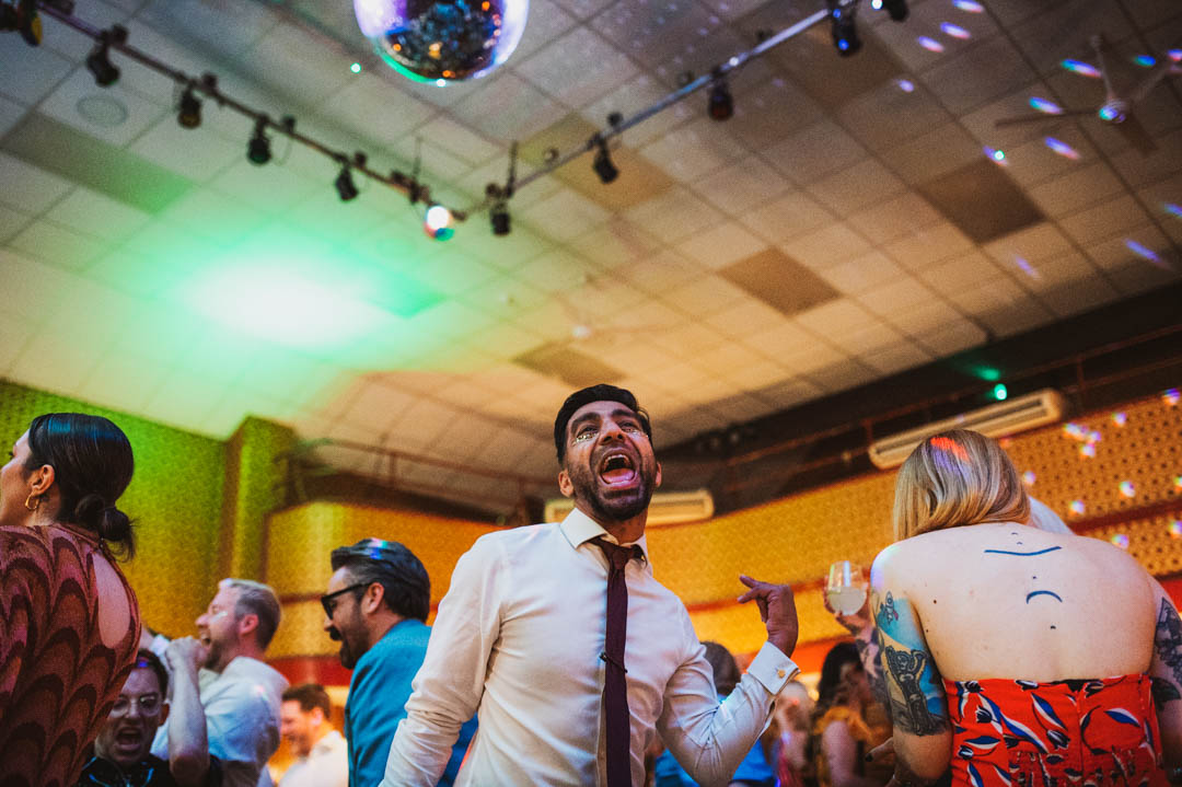 fun wedding candid dancefloor photo