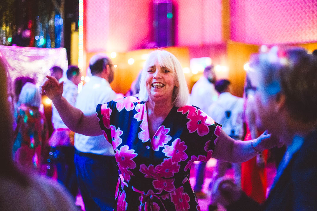 guest dancing and signing