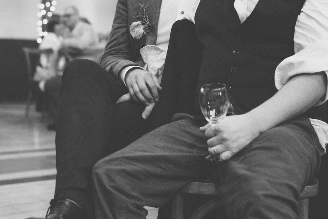 two grooms hands detail