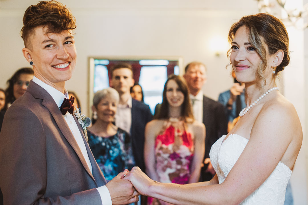 Southwark Register Office lesbian couple holding hands