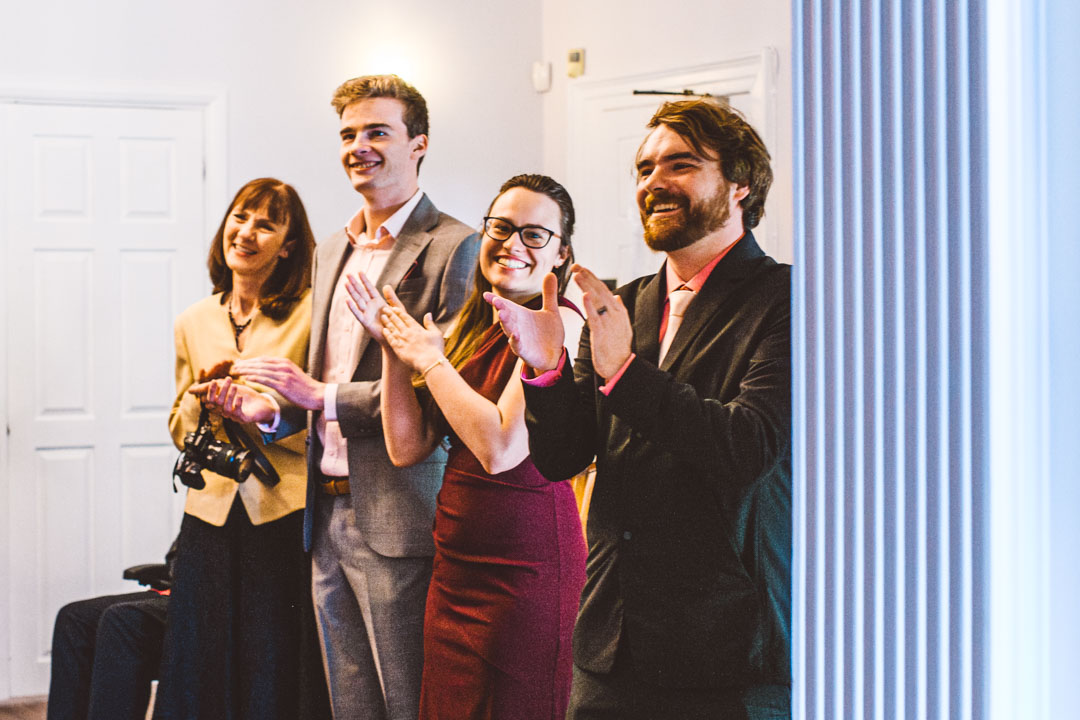 wedding guests clapping