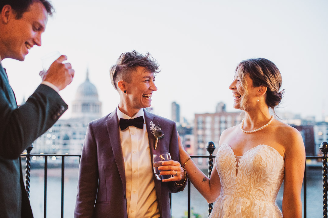 two brides on balcony