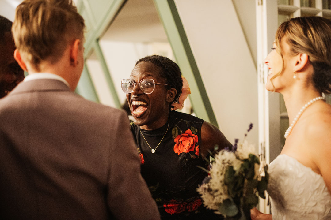 candid photo of surprised wedding guest