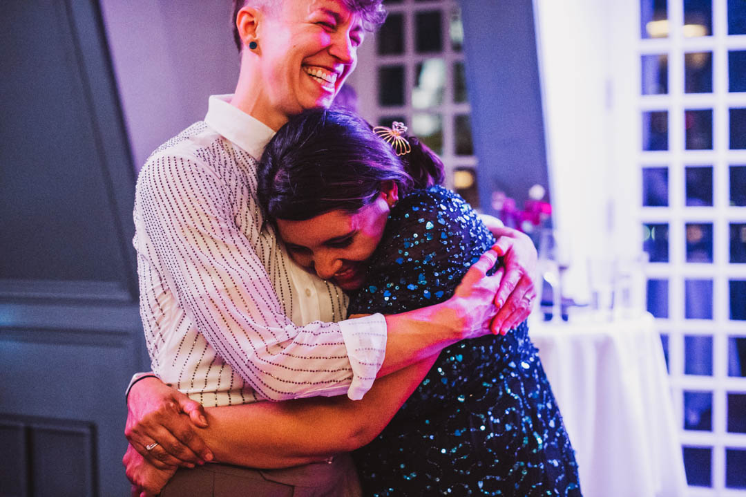 bride and friend hugging