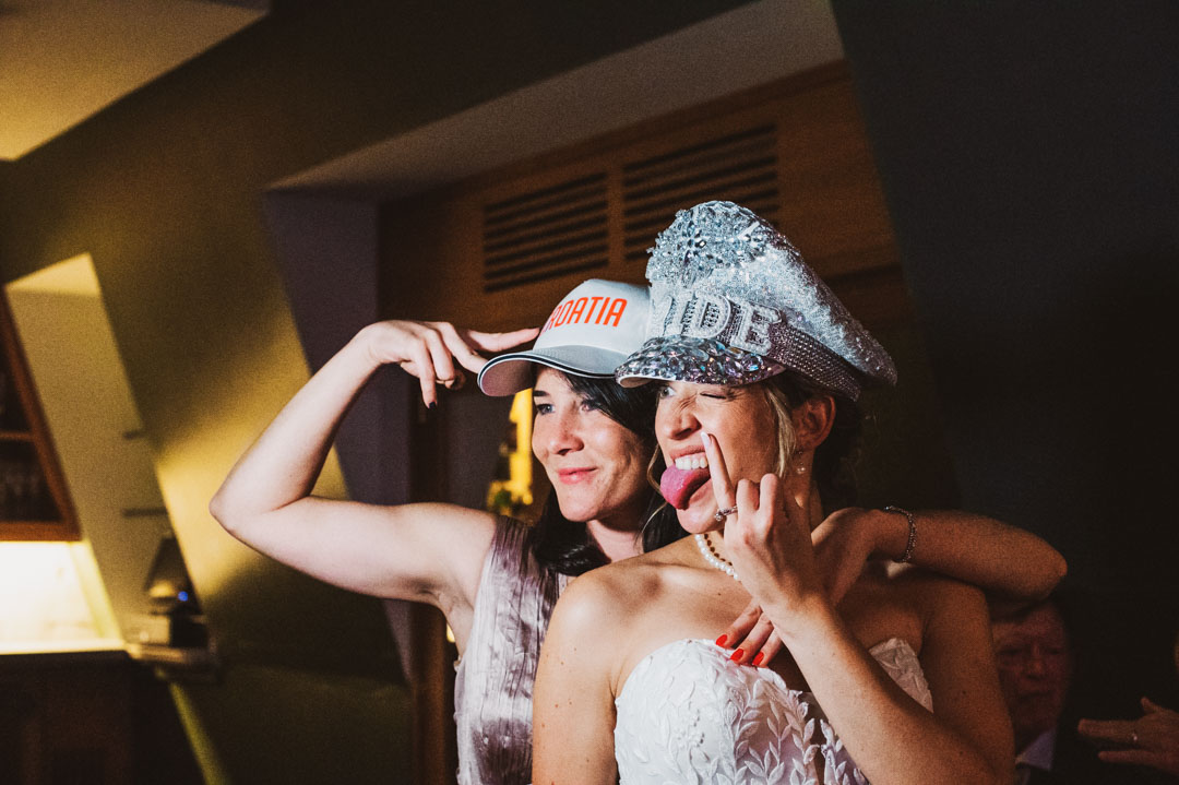 The Swan at the Globe wedding photobooth bride with friend