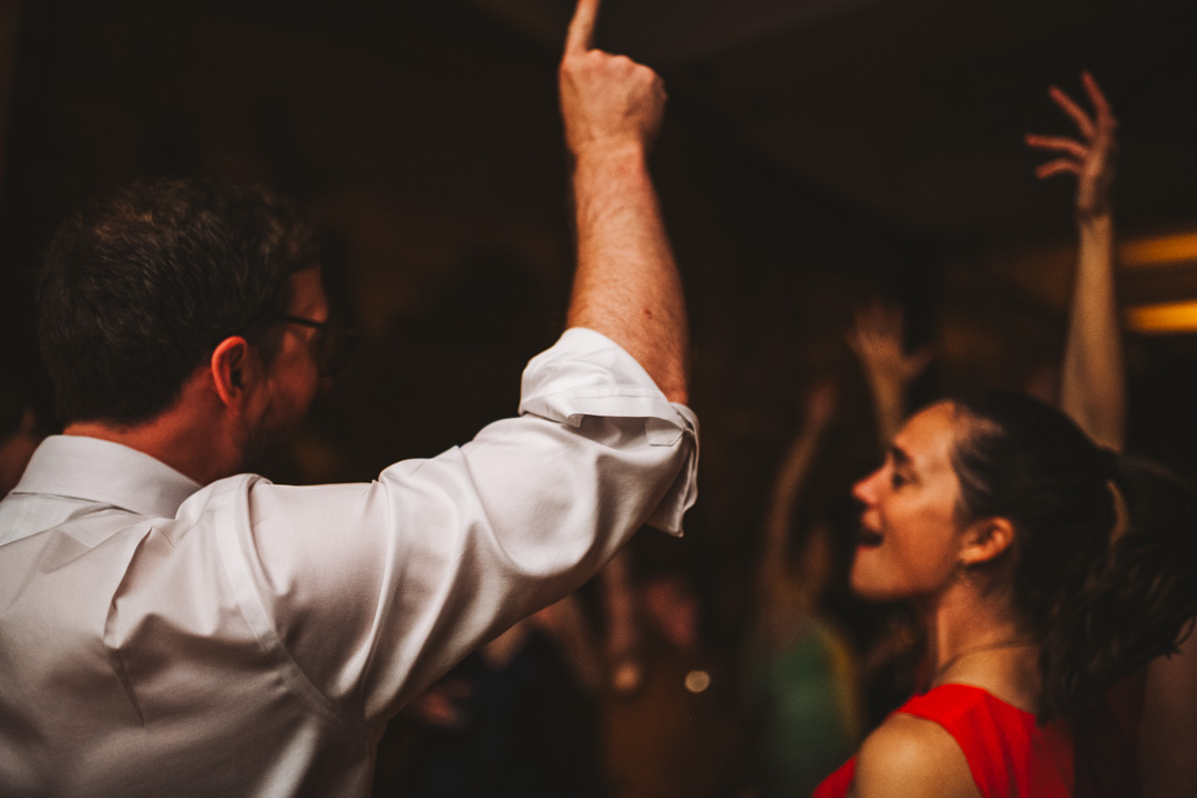 Town Hall Hotel wedding party hands in the air
