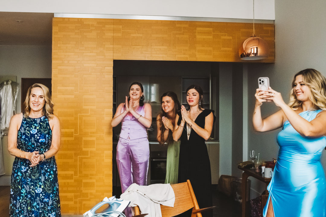 bridal party clapping