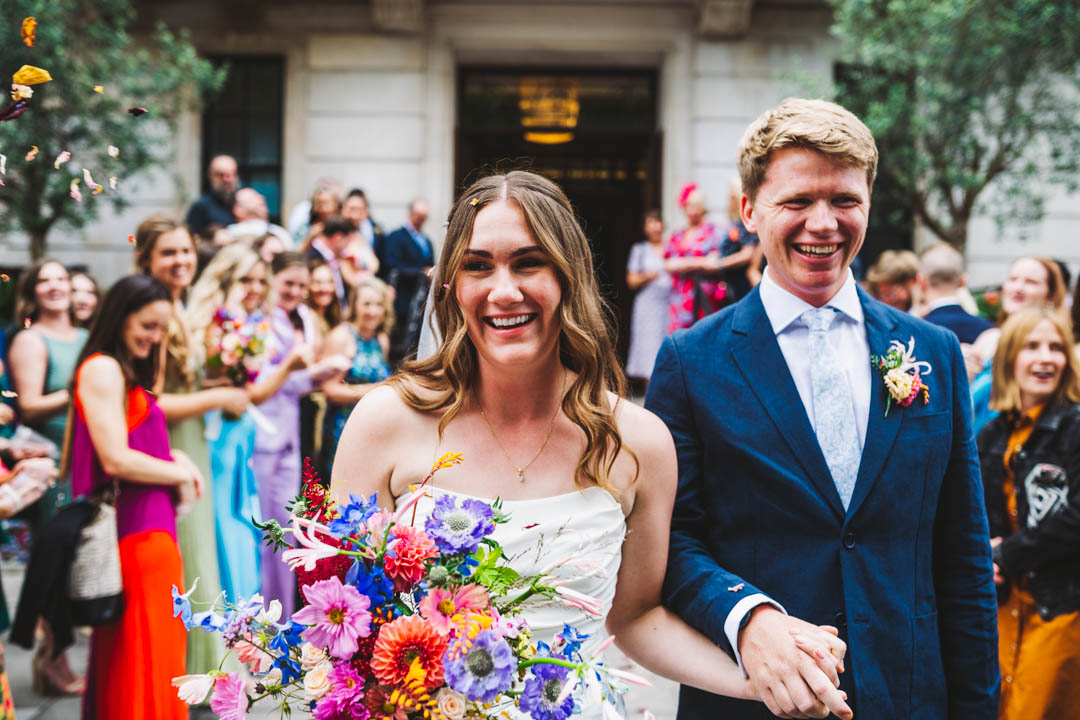 bride and groom smiling