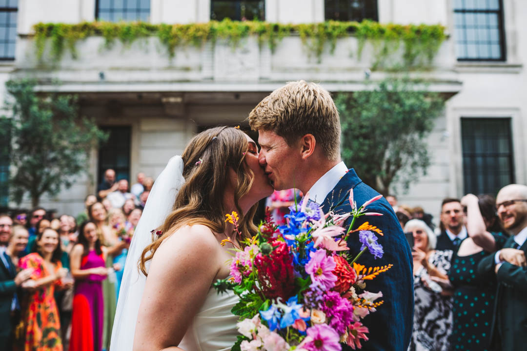 bride and groom kissing